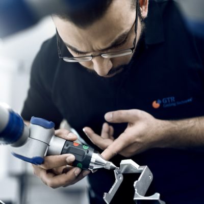 Employees test 3D arm assembly at foundry GTR casting technology